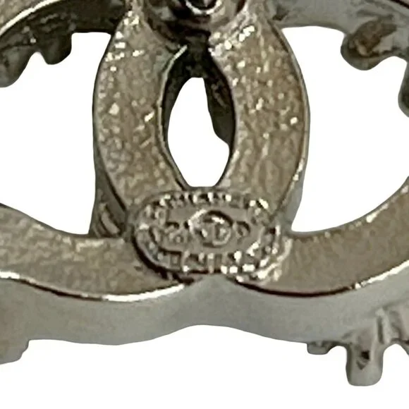 CHANEL Silver Logo Earrings